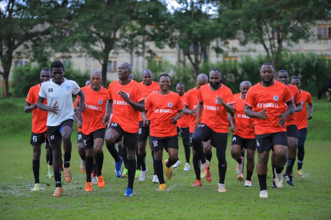 Mzee Wawanja players running together at training